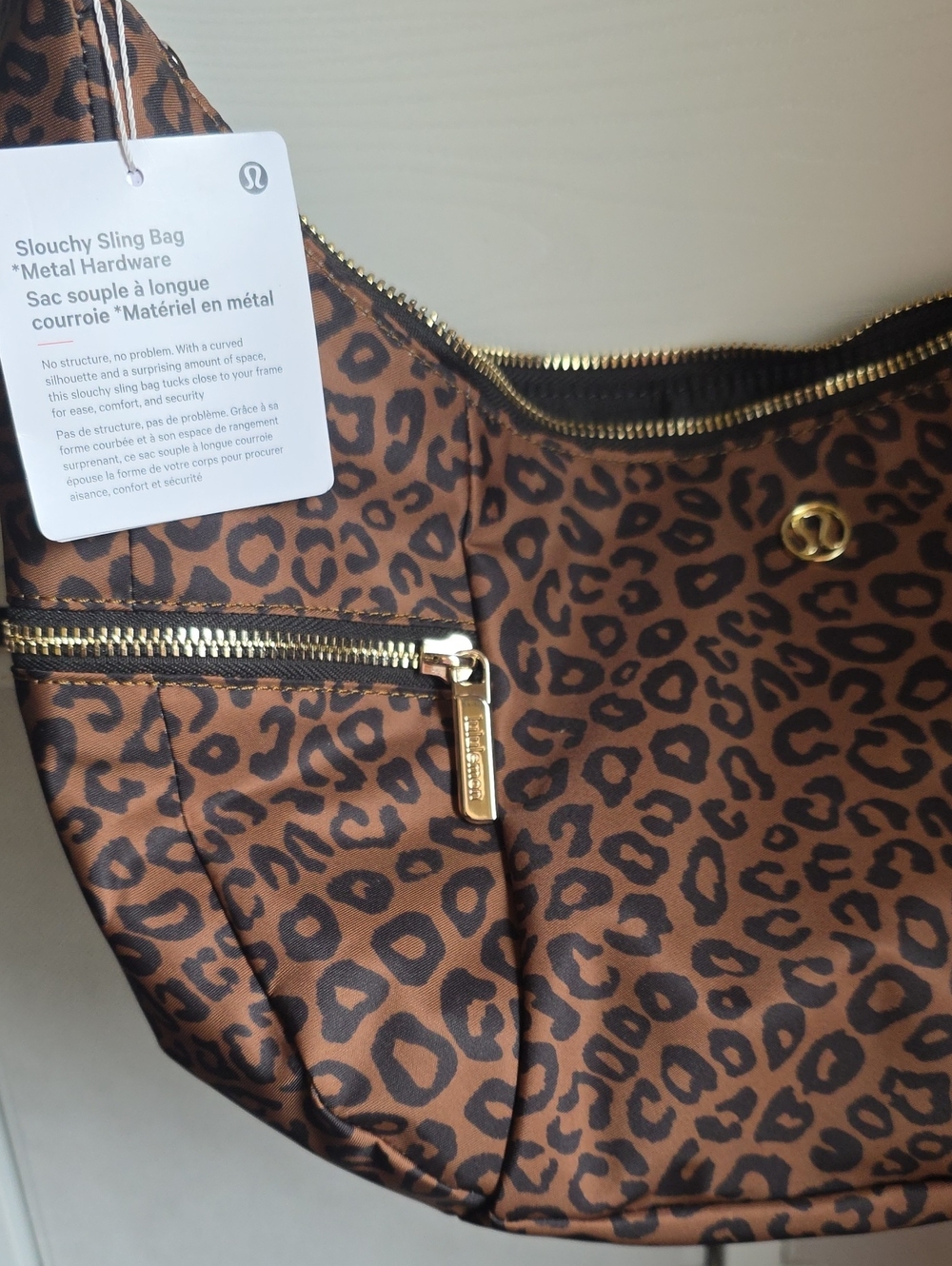 lululemon athletica Leopard Print Slouchy Sling Bag in Brown and Black.NWT